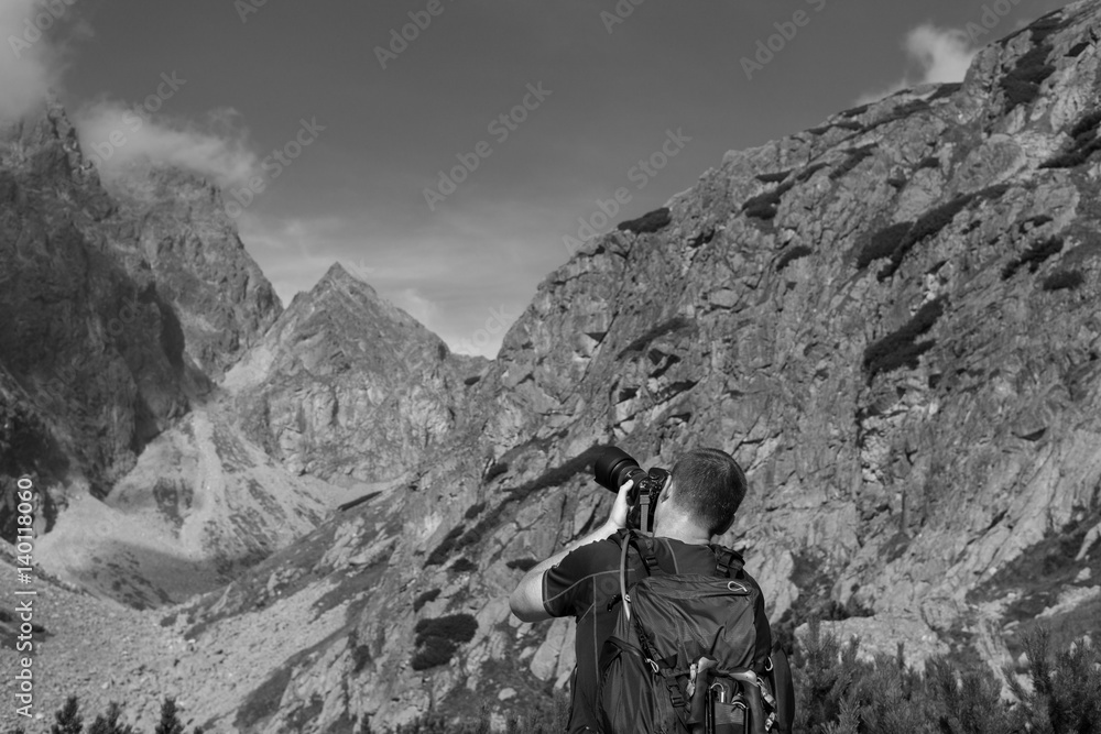Photographer in High Tatras Mountains. Slovakia
