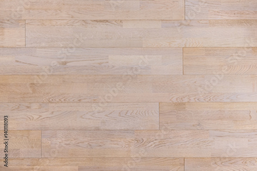 Laminate parquet flooring. Light wooden texture background