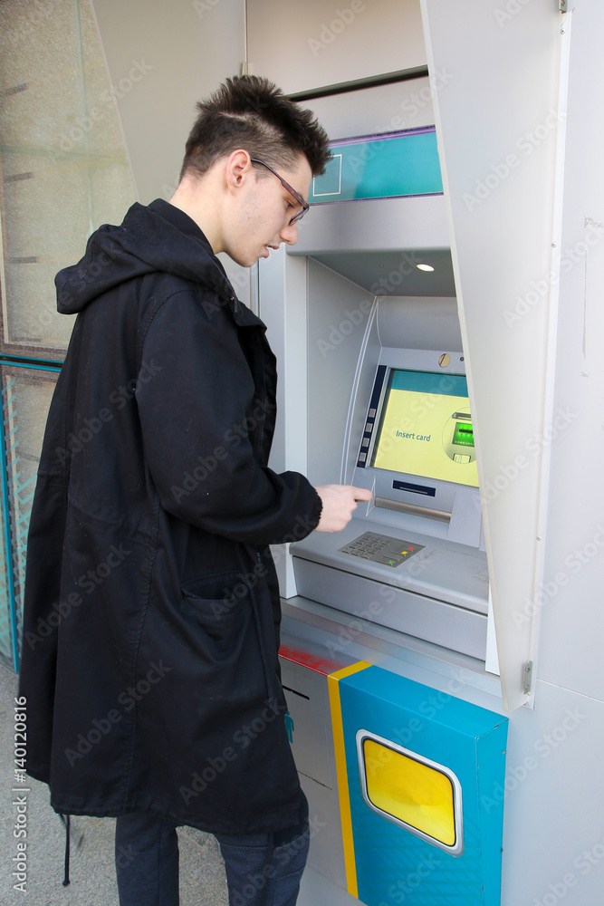Boy raises money from an ATM