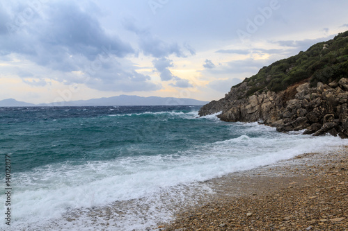 Big waves in the beach and rocks in Datca in stormy weather