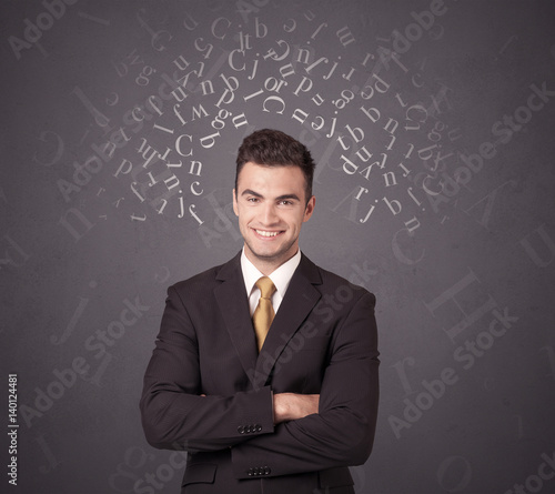 Businessman with alphabet