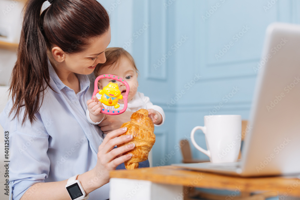 Active charismatic woman enjoying her branch with her daughter Active charismatic woman enjoying her branch with her daughter