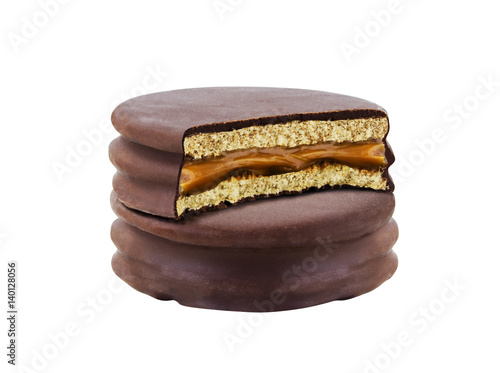 advice with bite chocolate alfajor biscuit cookie, caramel filled and white background