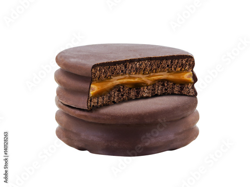 advice with bite chocolate alfajor biscuit cookie, caramel filled and white background