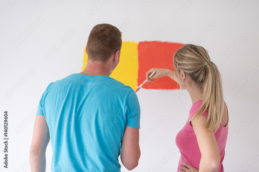 Fototapeta premium couple painting interior wall