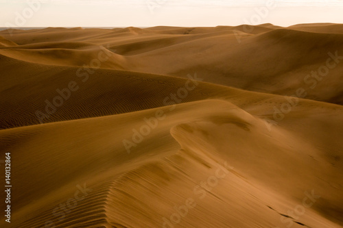 Sand dunes while sandstorm