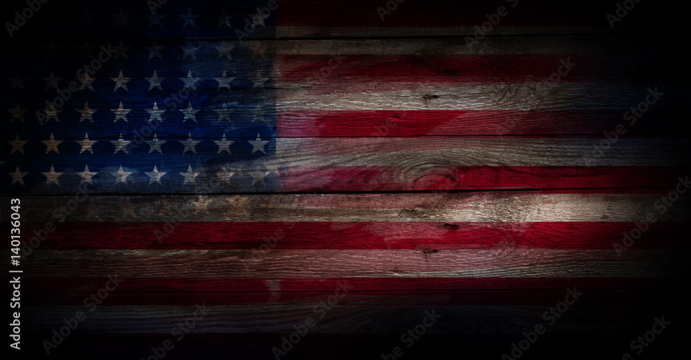 Fototapeta premium USA flag on a wood surface