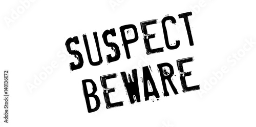 Suspect Beware rubber stamp. Grunge design with dust scratches. Effects can be easily removed for a clean, crisp look. Color is easily changed. photo