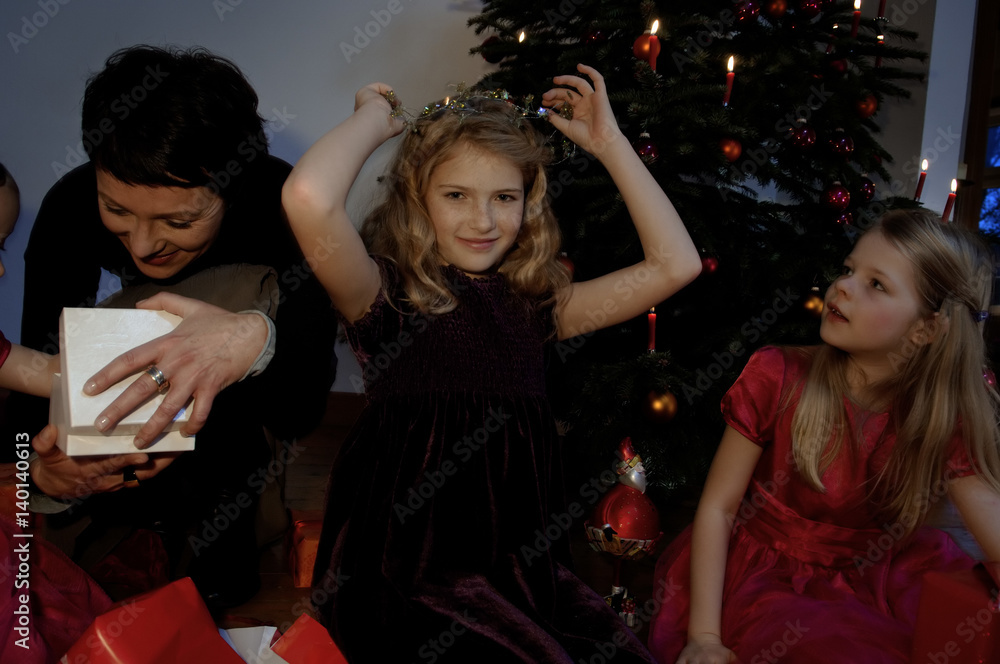 Girl presenting her Christmas gift