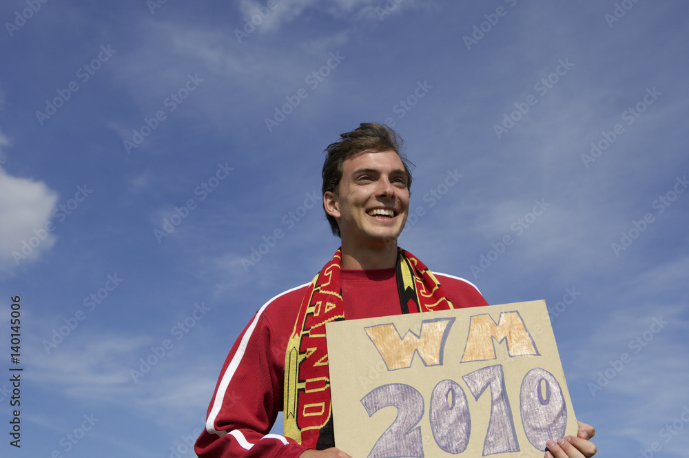 Fan holding WM 2010 sign