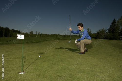 Young man on golf course