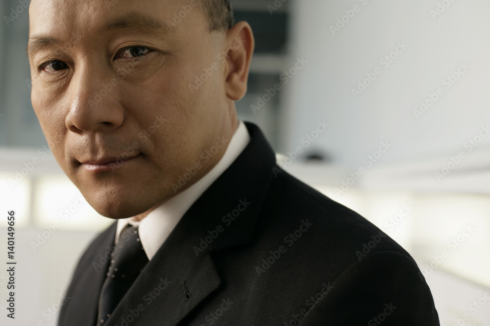 Portrait of an asian businessman in a hall Portrait of an asian businessman in a hall