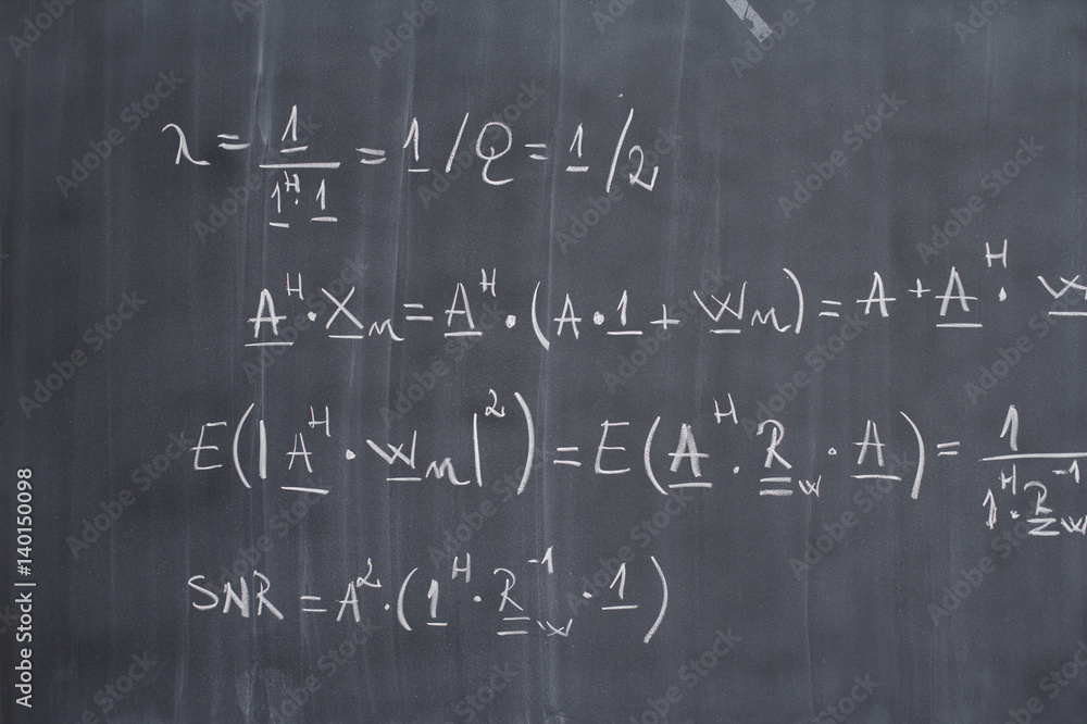 Blackboard with arithmetic's on it, close-up Blackboard with arithmetic's on it, close-up