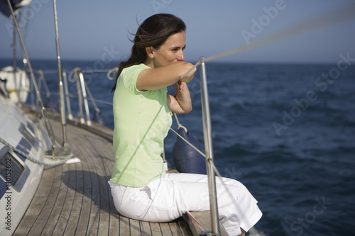 Woman sitting on a Yacht