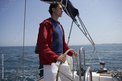 Man steering a Boat