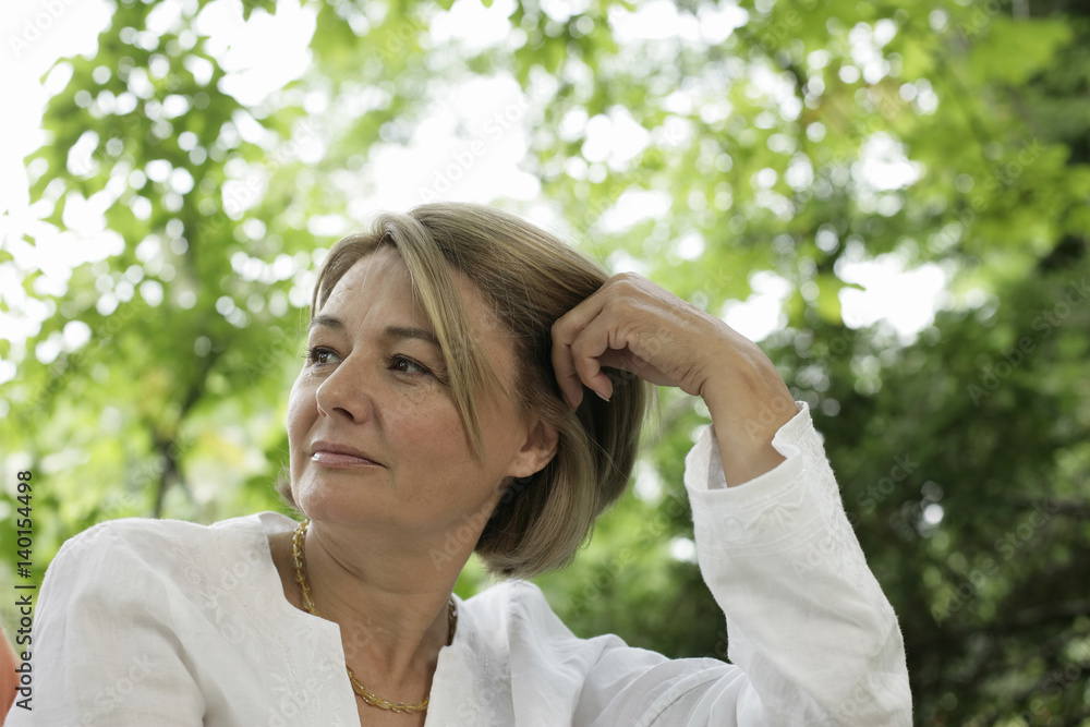 Mature woman looking sideward, portrait Mature woman looking sideward, portrait