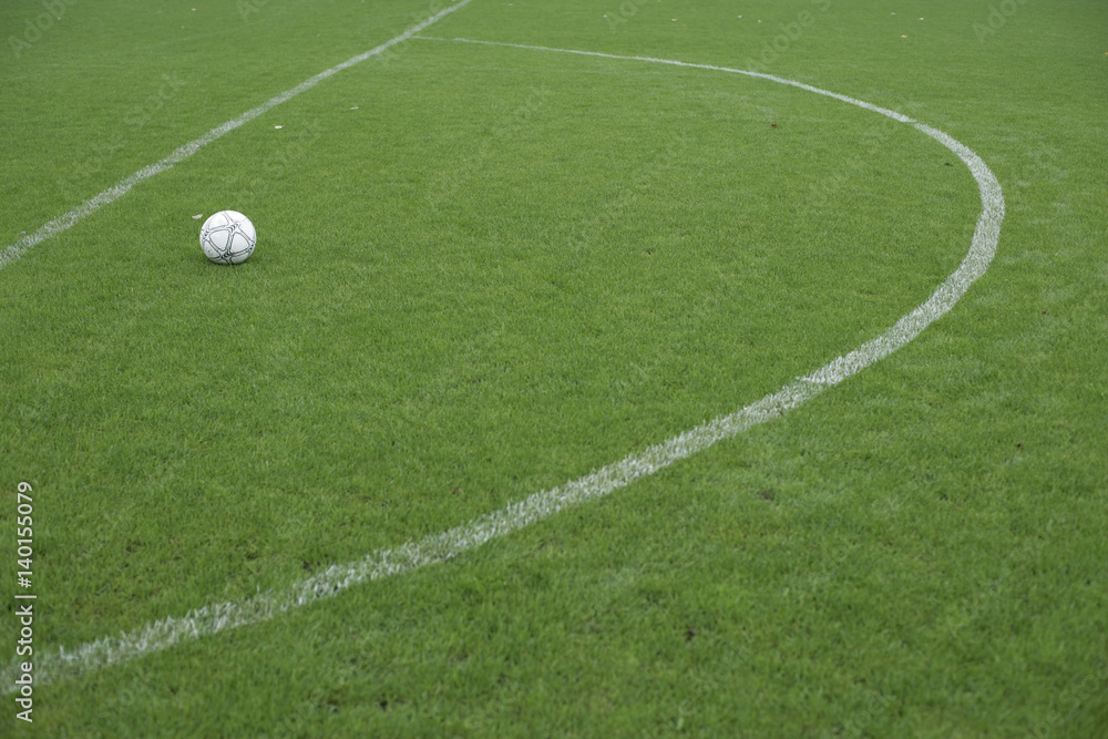 Football lying in a marked area, ready for direct free kick