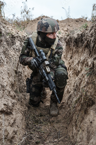 Paratrooper of french 1st Marine Infantry Parachute Regiment RPIMA in entrenchments