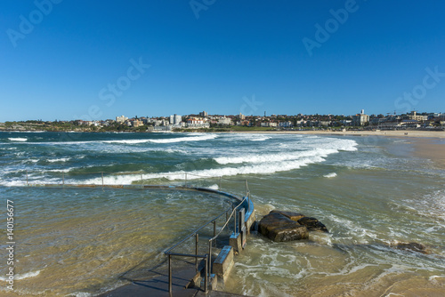 Bondi Beach Looking south tidal swimming pool Icebergs club storm abaiting. Sydney, Australia copyspace. photo