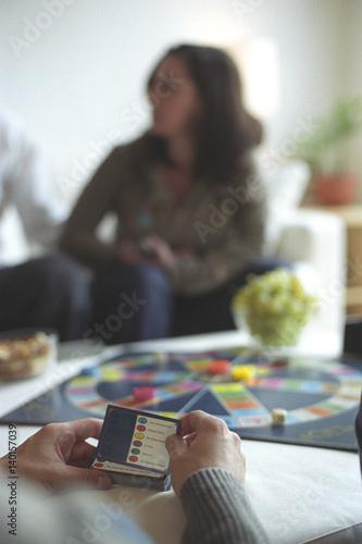 People playing Trivial Pursuit
