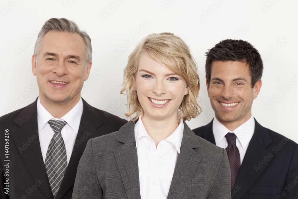 Three confident businesspeople, Bavaria, Germany Three confident businesspeople, Bavaria, Germany