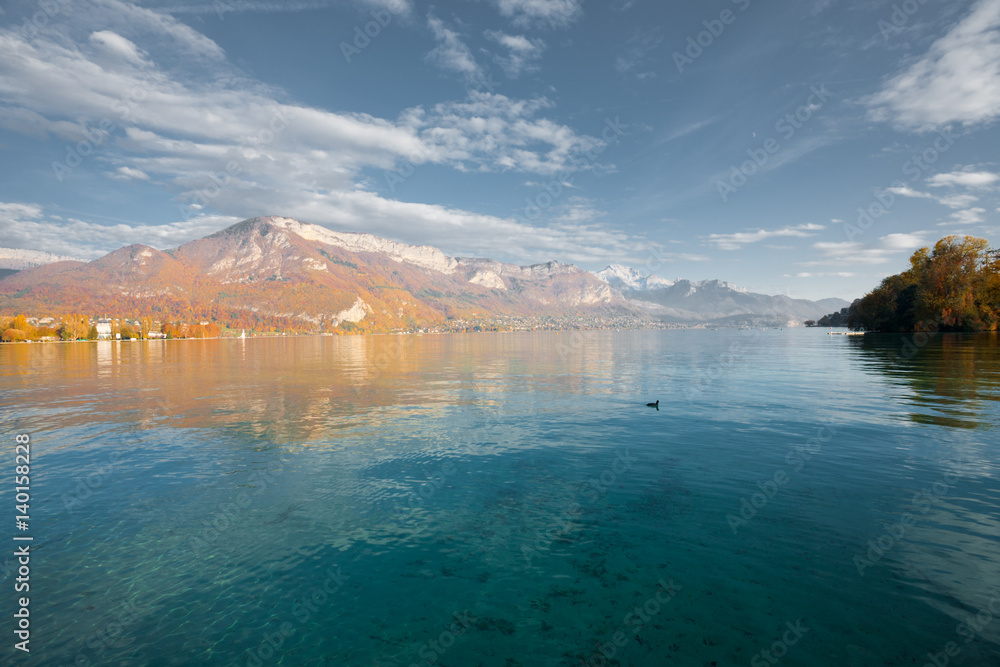 Naklejka premium Lake Annecy at French Alps Autumn Colors in France. Horizontal