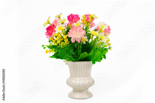 Multicolored flowers  in a vase, isolated on white background with clipping path.