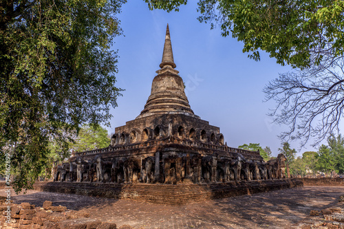 Ancient pagoda with attached elephant statues at Wat Chang Lom at Si Satchanalai Historical Park, Sukhothai, Thailand : Unesco world heritage photo