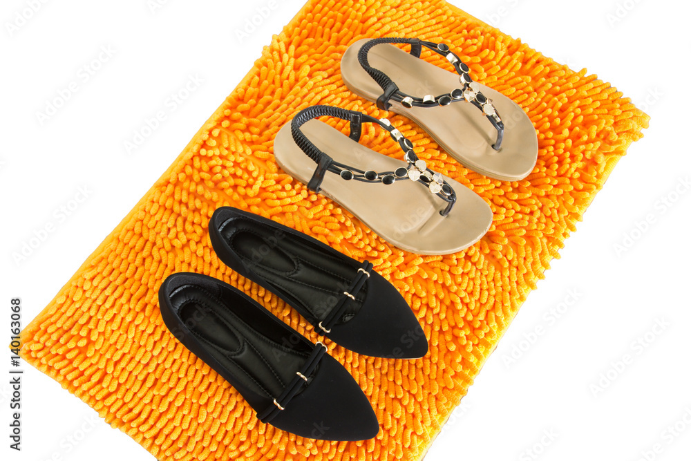 Shoe on orange mat isolated on white background Shoe on orange mat isolated on white background