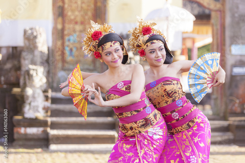 BALI - 6 March 2017 : girl performing traditional Indonesian dance at Ulun Danu temple Beratan Lake in Bali Indonesia on 6 March 2017  in Bali, Indonesia.