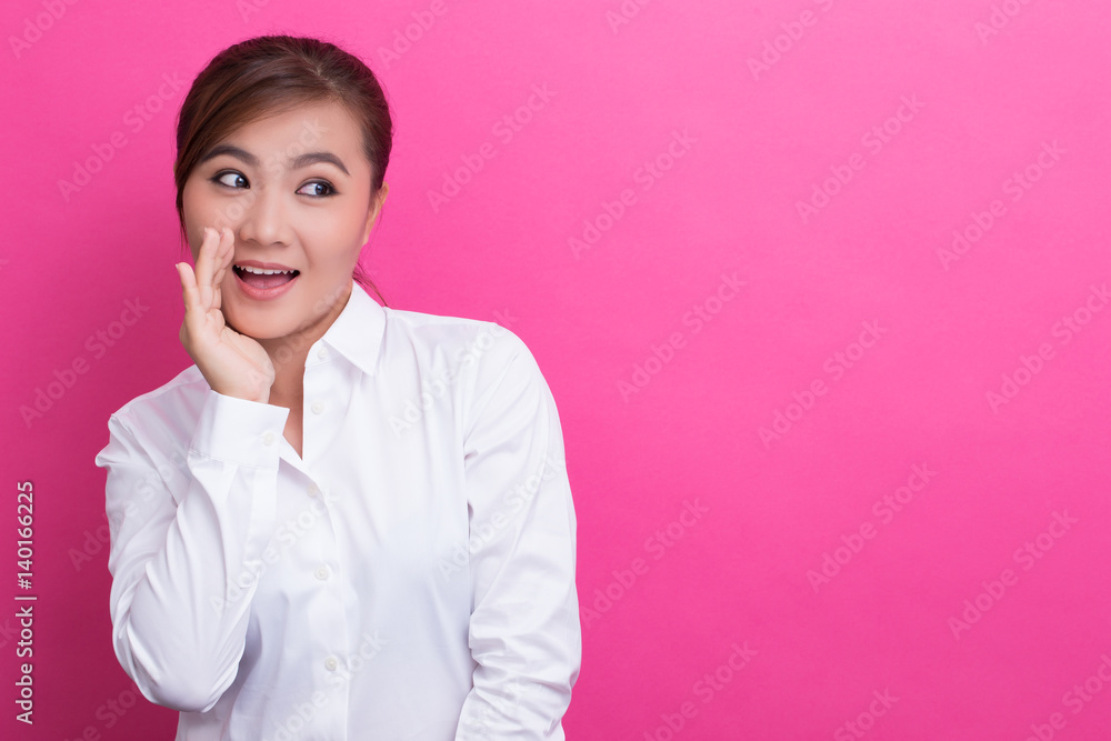 Happy asian woman make the gossip gesture Happy asian woman make the gossip gesture