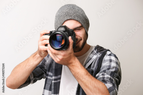 Handsome young photographer...