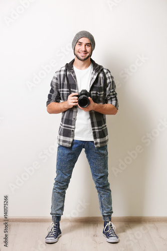 Handsome young photographer...