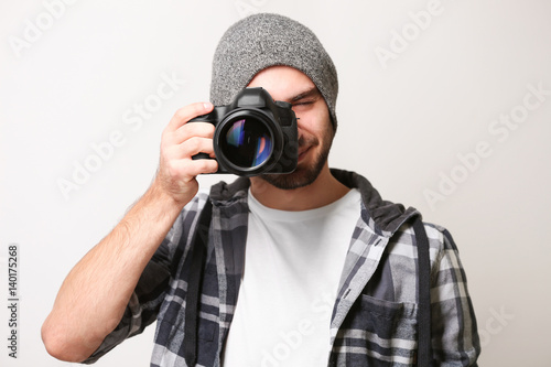 Handsome young photographer...