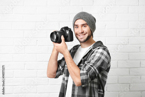 Handsome young photographer...
