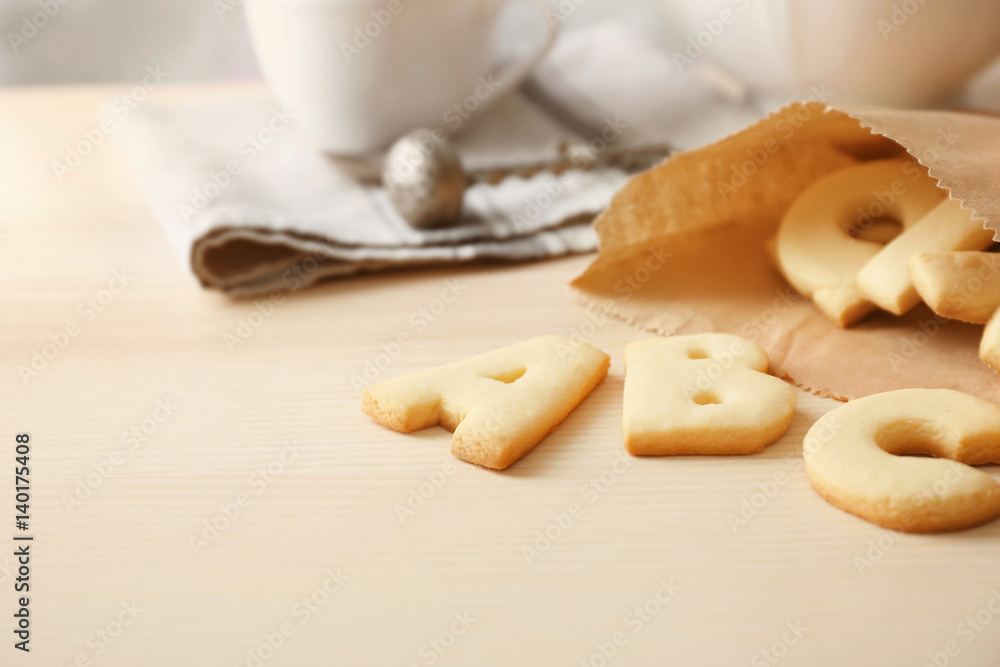 Cookie alphabet on kitchen table, closeup Cookie alphabet on kitchen table, closeup