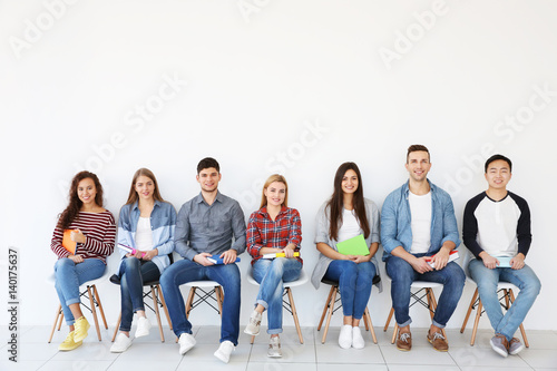 Group of people reading boo...