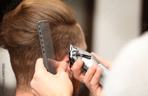 Barber making modern male h...