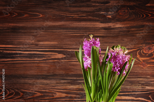 Beautiful hyacinth on wooden background