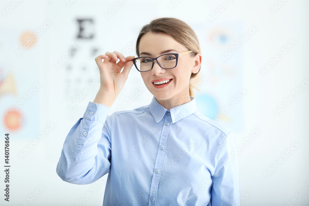 Woman with eyeglasses on blurred background Woman with eyeglasses on blurred background