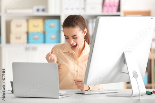 Young woman working at office
