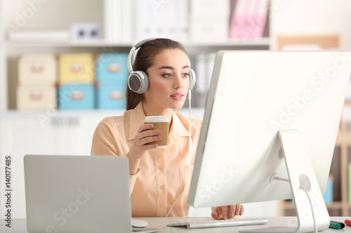 Young woman working at office