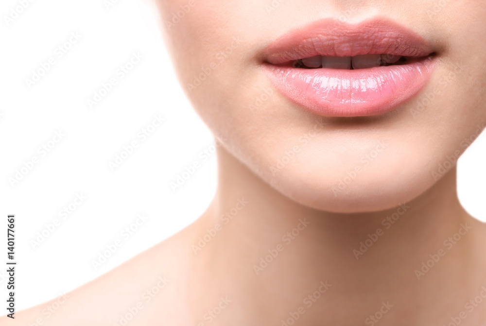 Obraz premium Face of young woman on white background