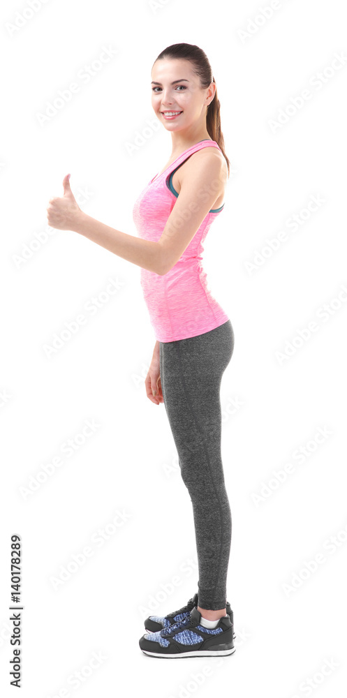 Incorrect posture concept. Young woman showing thumb up gesture on white background Incorrect posture concept. Young woman showing thumb up gesture on white background