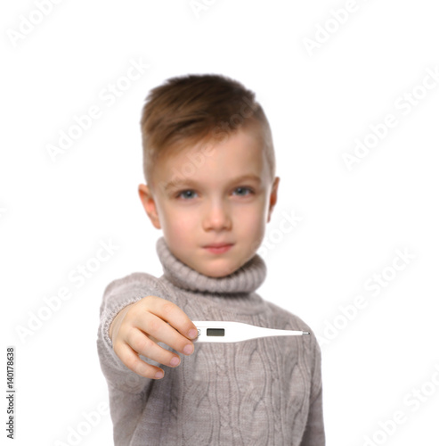 Cute little boy showing the...