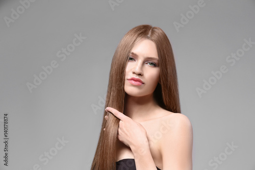 Attractive young woman with...