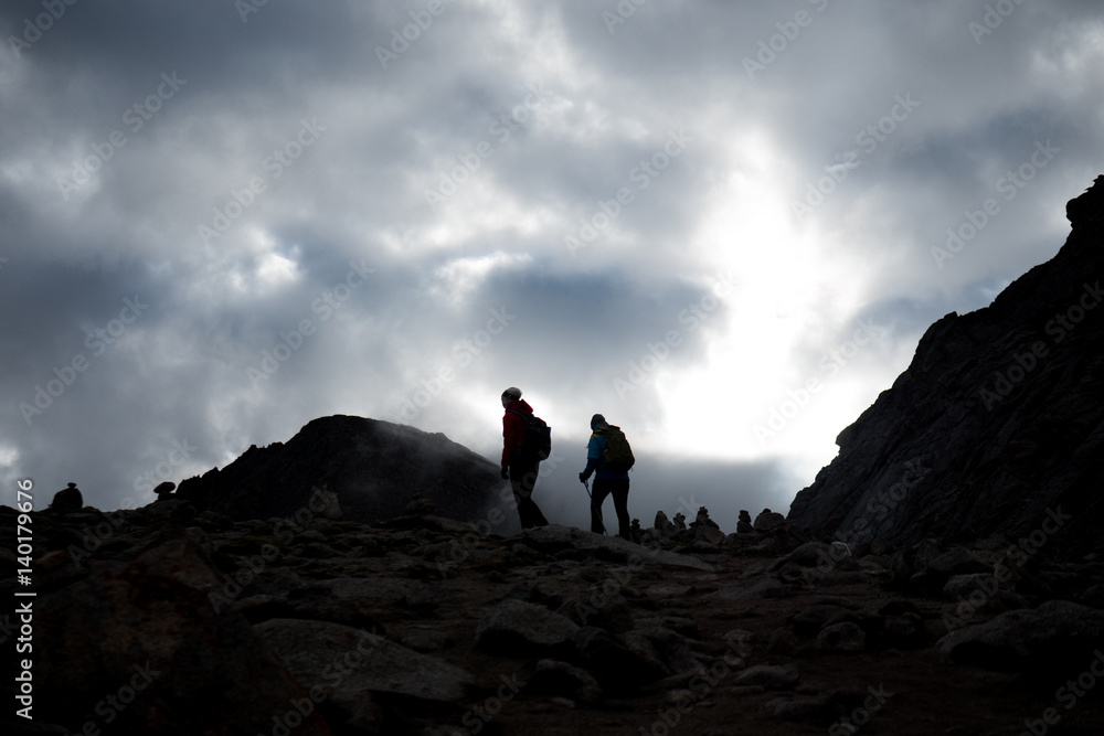 Silhouette of people go to Dolma La pass Himalayas mountain Kailas yatra