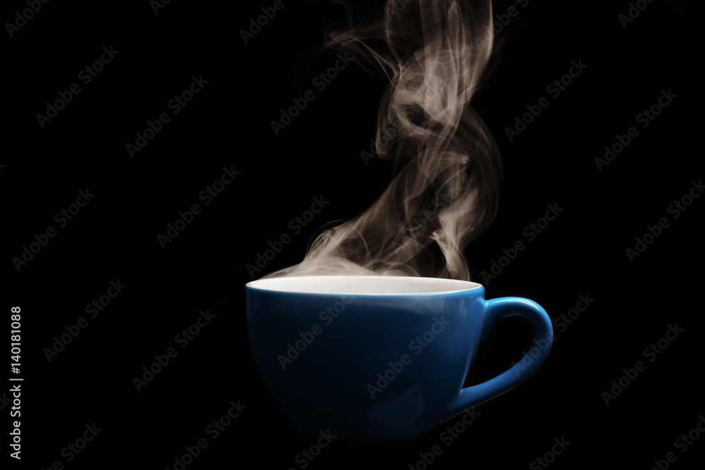 Steaming cup of coffee on black background Steaming cup of coffee on black background
