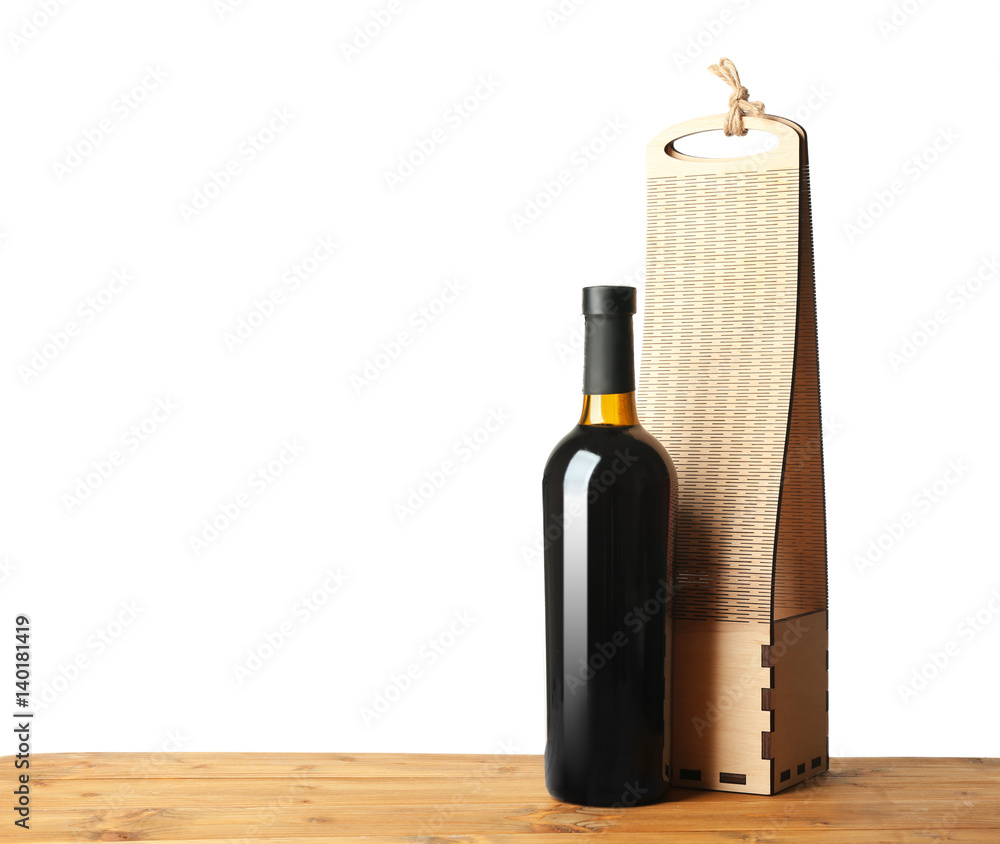 Table with wine bottle and gift box on white background Table with wine bottle and gift box on white background
