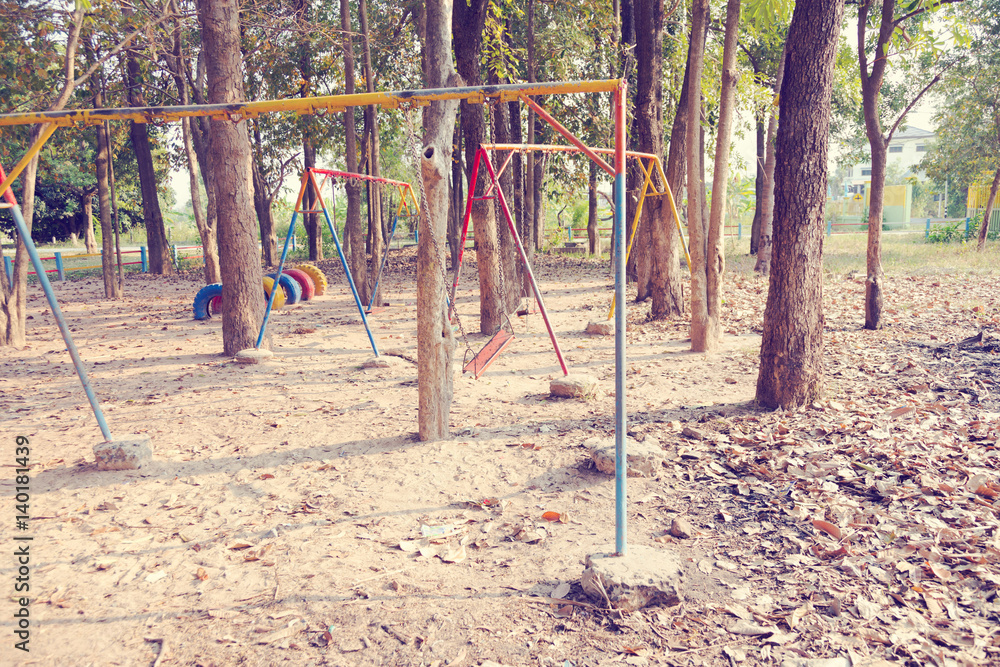 Children swing,playground in the park (vintage tone)